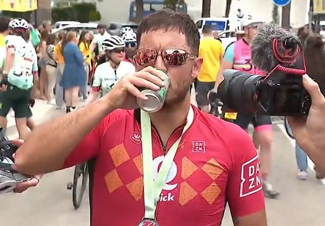 Former Chelsea and Real Madrid star chugs a beer after completing mammoth cycling event in Mallorca three years after retiring aged 32