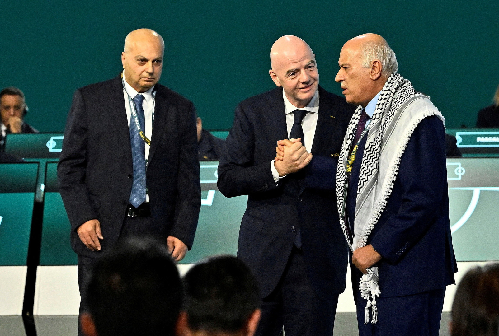 Palestinian football boss refuses Israeli handshake at FIFA event | Israel-Palestine conflict